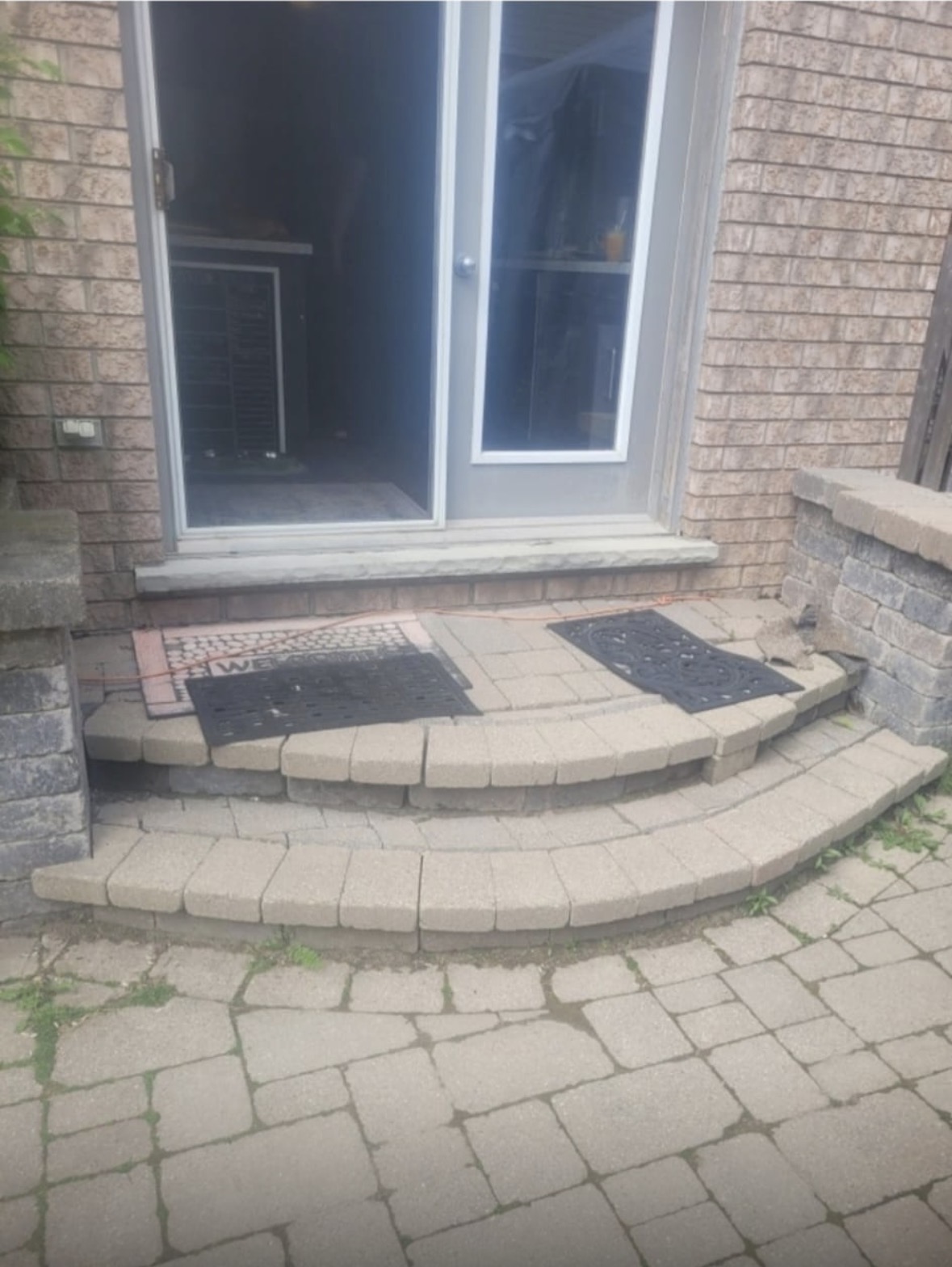 Front entrance stone steps and patio