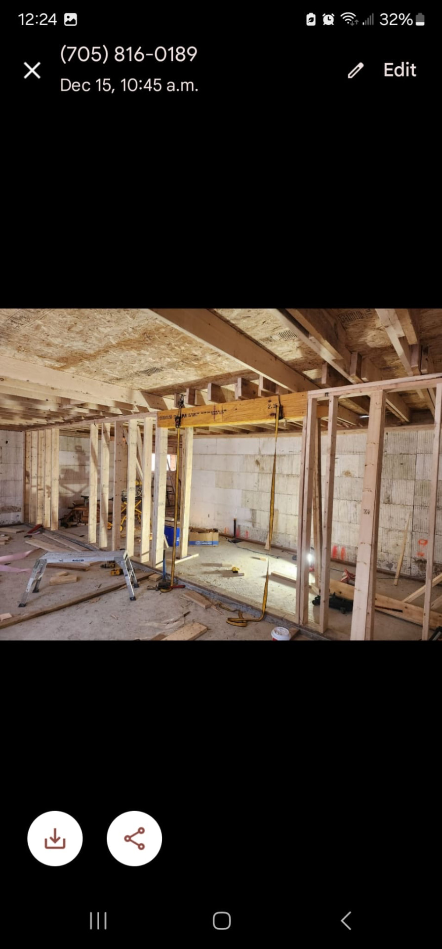 Basement renovation framing with steel beam and wooden stud walls