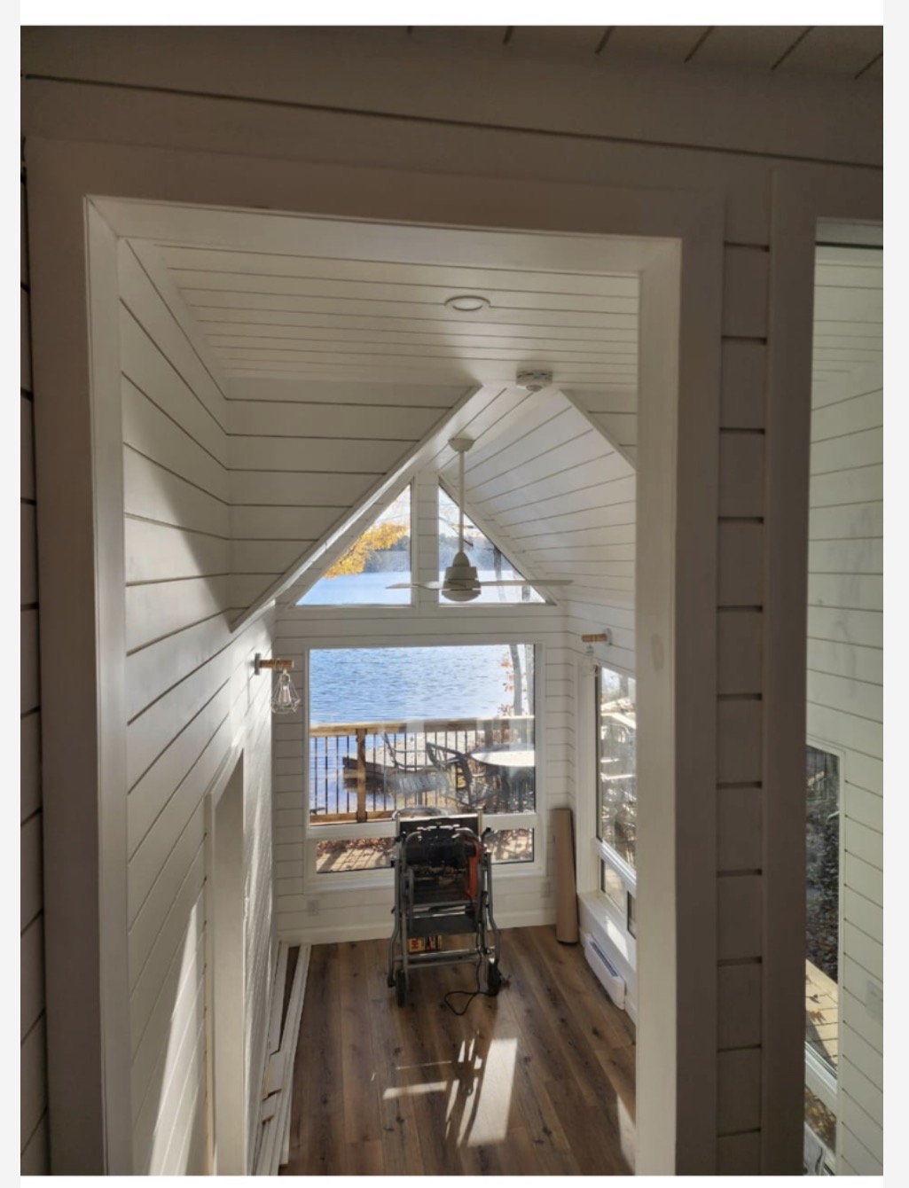 Finished sunroom with lake view