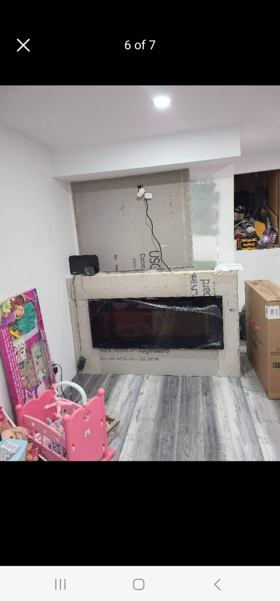 Fireplace feature wall built with cement board ready for stone veneer