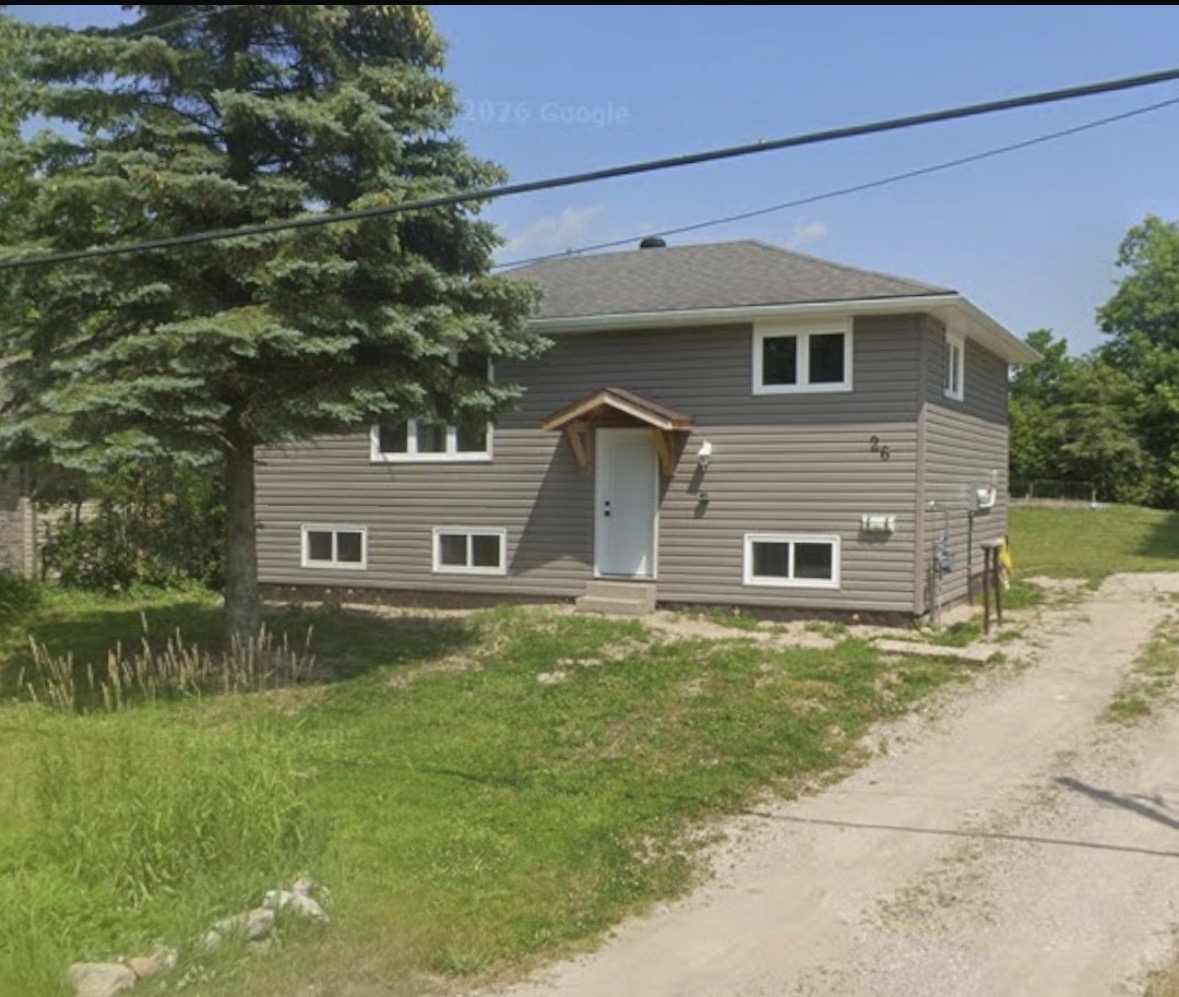 Completed house siding and front entrance