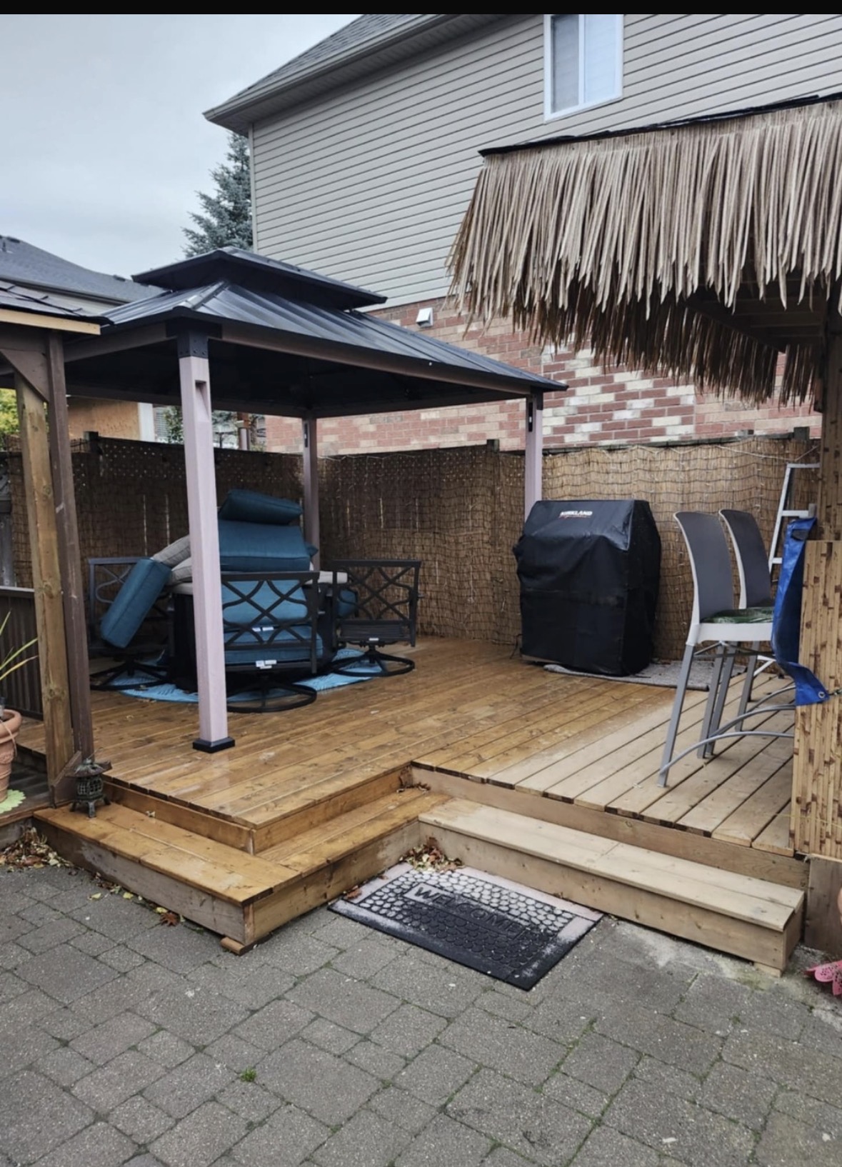Deck with gazebo and tiki bar